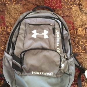 Gray Under Armour backpack.